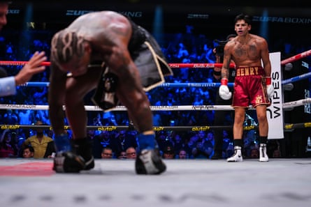 Ryan Garcia looks on after knocking down Conor Benn during their WBC welterweight title fight at T-Mobile Arena in Las Vegas.