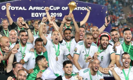 Riyad Mahrez lifts the trophy after Algeria win the Africa Cup of Nations in 2019.