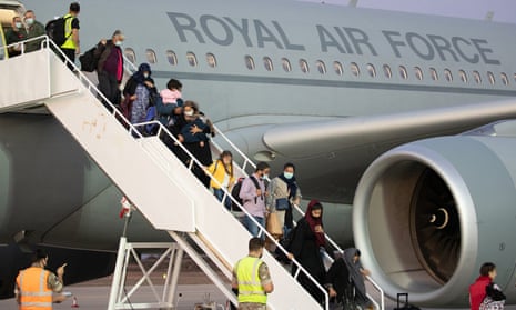 A photo issued by the Ministry of Defence (MoD) showing Afghans arriving in the UK in 2021