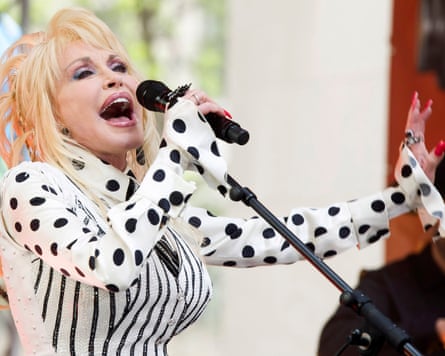 Dolly Parton performs in black and white outfit on NBC’s Today show in 2014.