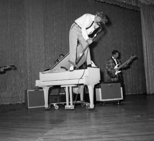 Singing atop a piano at the Cafe de Paris, Manhattan, 1958