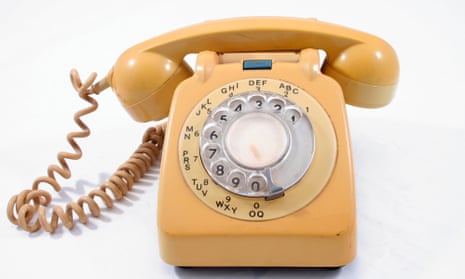 A retro yellow landline telephone