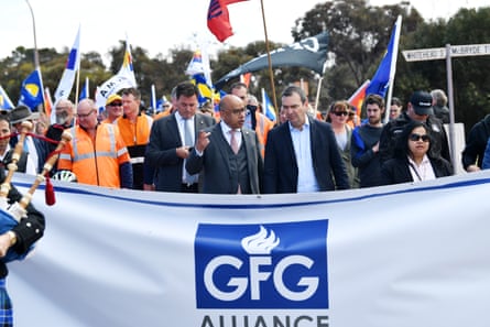 Two men behind a banner that reads GFG Alliance
