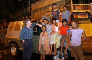Tim Grandage outside his old car in Kolkata.