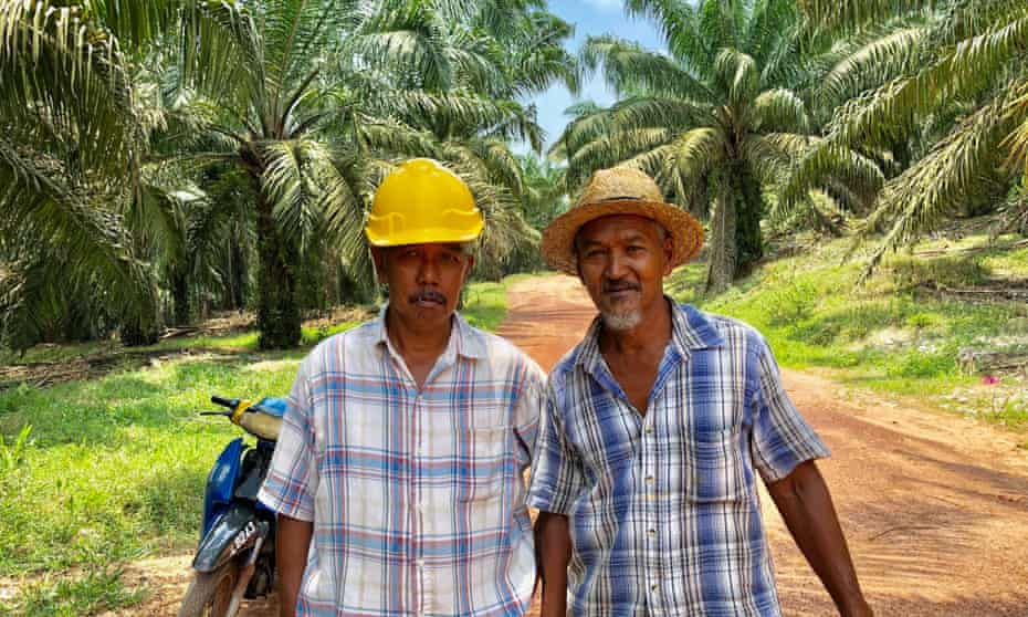 Malaysian palm oil farmers Nur Harun Muhammad and Nodin Bin Ramli.