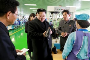 Kangwon, North Korea: Kim Jong-un visits a shoe factory