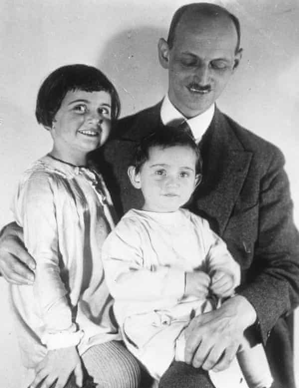 Anne Frank with her father and sister in 1931.