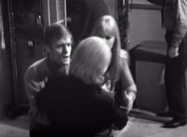 Ben (Michael Craze) and Polly (Anneke Wills) catch a body double for William Hartnell, as 'The Doctor' collapses at the opening of part three of ‘The Tenth Planet’