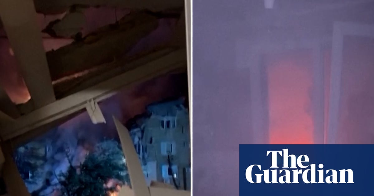 Kyiv resident films moments after rocket hits residential building – video