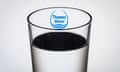 A glass of water with the Thames Water logo on it