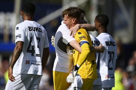 Telstar goalkeeper Ronald Koeman Jr is hugged by a team-mate after his late penalty rescued a point.