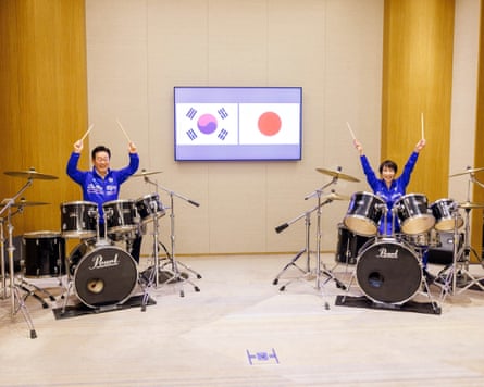 South Korean president Lee Jae Myung and Sanae Takaichi bond over a shared drum session, 13 January.