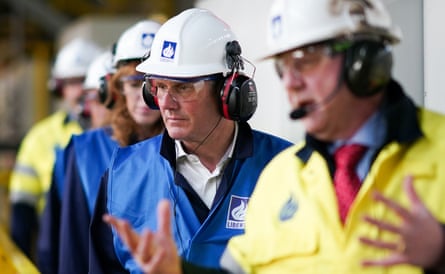 Keir Starmer and Angela Rayner wear hard hats with the Liberty logo on them