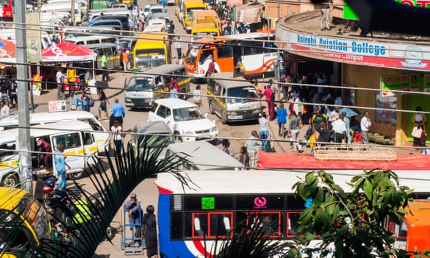 Buses and matatus along Latema Street, Downtown Nairobi, Kenya.