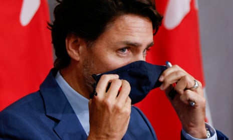 Canada’s Prime Minister Justin Trudeau prepares to leave a news conference on Parliament Hill in Ottawa. Ontario and Quebec together account for 79% of the 150,140 cases reported in Canada so far and 93% of the 9,249 deaths.