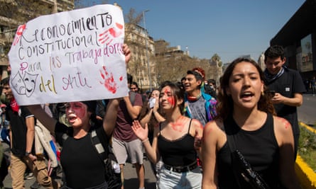 Students demonstrate to demand a new constituent assembly process, in the surroundings of La Moneda presidential palace in Santiago on 14 September.
