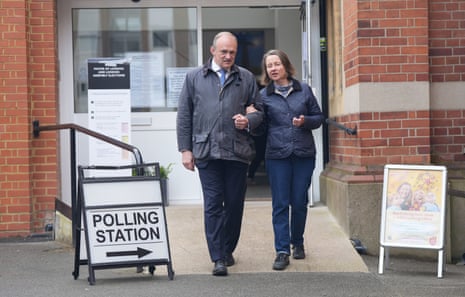 The Lib Dem leader Ed Davey and his wife Emily Gasson leaving the polling station at Surbiton Hill Methodist Church, south west London, after casting their votes