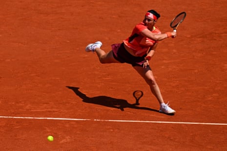 Ons Jabeur plays a forehand return to Brazil's Beatriz Haddad Maia