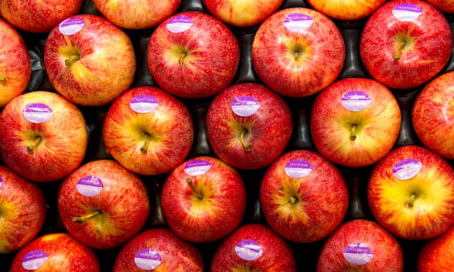 Tray of apples on display in a supermarket
