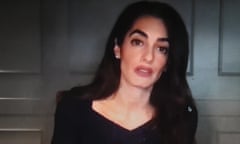 Human rights lawyer Amal Clooney gives evidence video link to a Senate inquiry into a Magnitsky act on Friday.