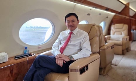 Thaksin Shinawatra inside a plane