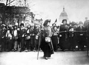 American suffragette Rosalie Jones leads a crowd of protesters up Pennsylvania Avenue after a march from New York in 1913.
