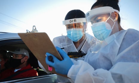 Healthcare workers in El Paso, Texas. More than 11 million Americans have been infected during the pandemic, by far the largest total in the world.