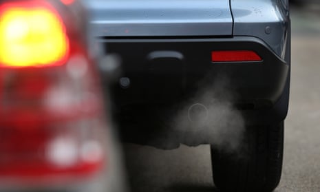 Exhaust fumes from a car in Putney High Street, London