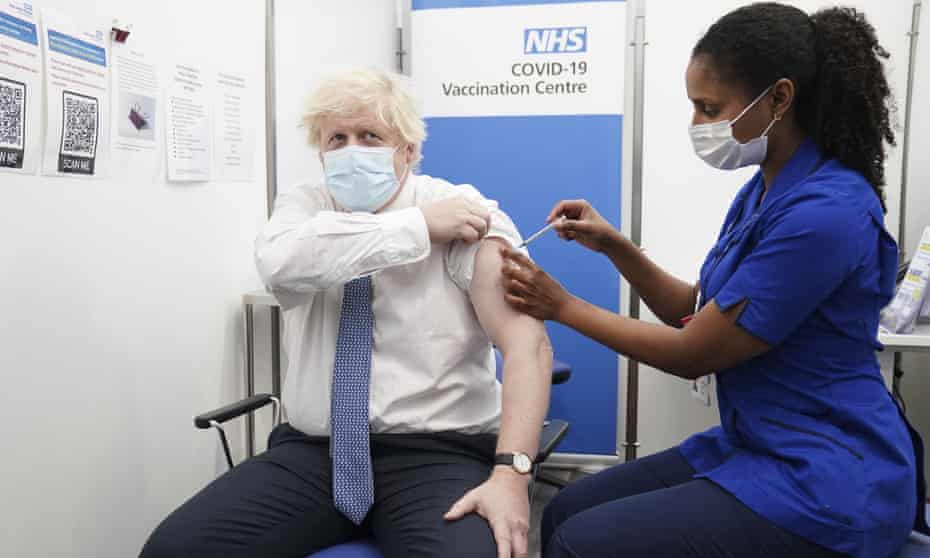 Boris Johnson receives his booster shot of the coronavirus vaccine