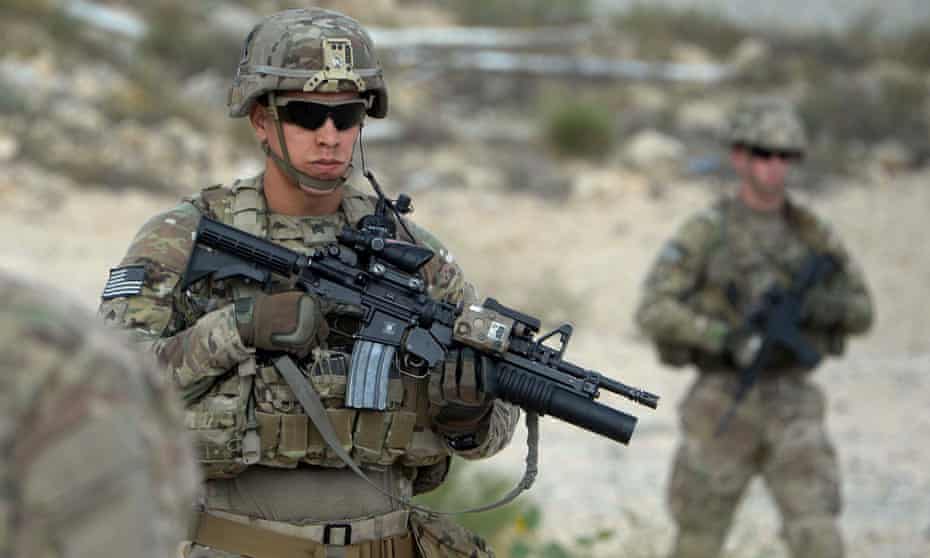 US soldiers patrol in Afghanistan. President Barack Obama announced last year that thousands of US troops will remain in the country past 2016, retreating from a major campaign pledge.