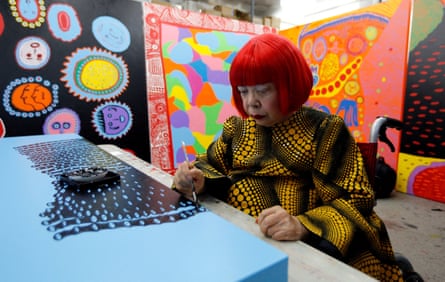 Kusama at work in her studio in Tokyo, Japan in 2017.