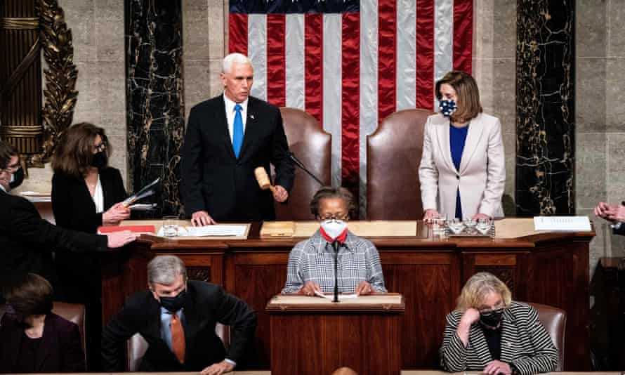 Mike Pence and Nancy Pelosi preside over a joint session of Congress to certify the 2020 electoral college results on 6 January 2021.