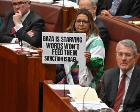 Greens Senator Mehreen Faruqi protests during Governor-General Sam Mostyn’s speech in the Senate chamber.