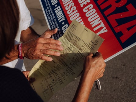 Ronnie Garza explains who’s on the ballot to voters in Uvalde, Texas on 4 November 2022.