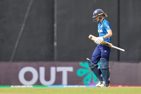 Amy Jones trudges off after being run out