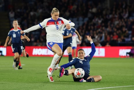 England's Alessia Russo evades the challenge from Greece's Eleni Markou before scoring their first goal.