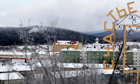 The IK-3 penal colony in Kharp, near Salekhard in the Yamal-Nenets region of Russia, where Navalny was serving his prison sentence: yellow, green and white concrete blocks of buildings set in a snow-covered landscape with forests and hills seen in the background, under a grey sky