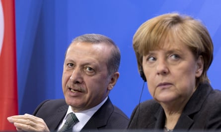 German chancellor Angela Merkel listens to Turkey’s president Recep Tayyip Erdoğan at a press conference in Berlin last month.