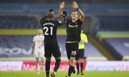 Angelo Ogbonna celebrates with his teammate Tomas Soucek as the West Ham goalscorers earn victory at Leeds