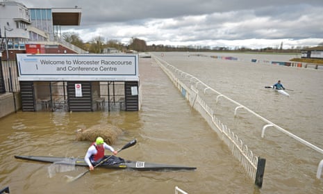 Members of Worcester Canoe Club kayaking on a flooded Worcester racecourse.
