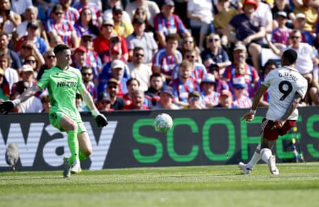 Dean Henderson saves well from Gabby Jesus at Selhurst Park.