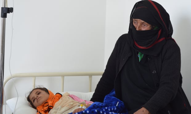 Eman, 12 Years old, with her grandmother on 22 May 2017 in hospital in Amran Governorate.