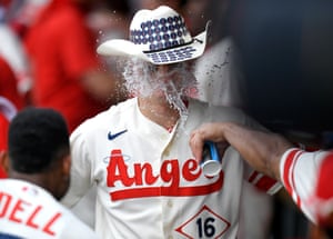 Anaheim, US: Mickey Moniak of the Los Angeles Angels is congratulated for his home run with a cowboy hat and cup of water to the face in the ninth inning against the Oakland Athletics