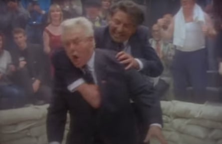 Ronald Reagan and Konstantin Chernenko lookalikes tussle in the Two Tribes video.