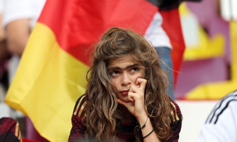A disconsolate Germany fan during the game against Japan.