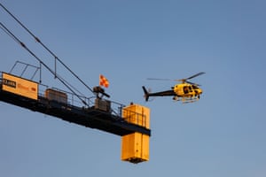 A police helicopter flies over the National Mall