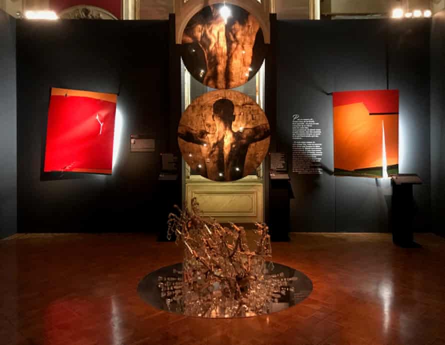 Works by Andy Lianes Bulto, centre, and Saliba Doueihy, left and right, in the exhibition Wounded Art