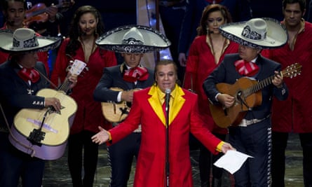 Juan Gabriel, pictured performing in 2012, was known for his outlandish costumes.
