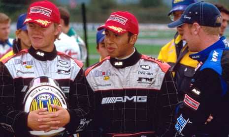 Nico Rosberg (left) and Lewis Hamilton (centre) as teammates back in their Karting Championships days in 2001.