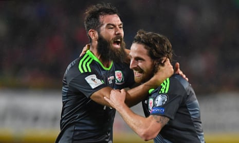 Joe Allen (right) celebrates with Joe Ledley after giving Wales the lead in the 22nd minute in their 2018 World Cup qualifier against Austria in Vienna with a stunning volley